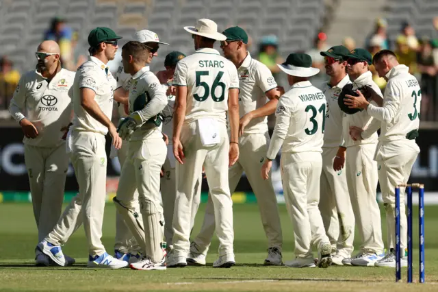 Australia celebrate after Nathan Lyon dismissed Abdullah Shafique on 42