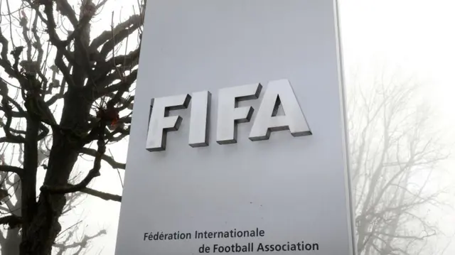 FIFA's logo is seen in front of its headquarters during a foggy autumn day in Zurich, Switzerland November 18, 2020