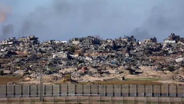 A picture taken from southern Israel on the border with the Gaza Strip shows smoke billowing over northern Gaza on December 16, 2023, amid ongoing battles between Israel and the Palestinian militant group Hamas.