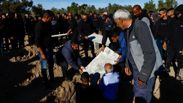 Mourners attend the funeral of Samer Fouad Al-Talalka, a member of Israel's Bedouin Arab minority who was mistakenly killed by the Israeli military while being held hostage in Gaza by the Palestinian Islamist group Hamas, in Hura village, southern Israel, December 16, 2023.