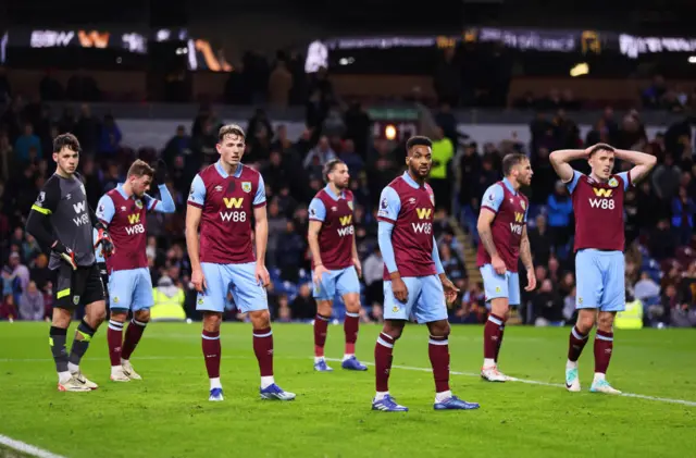 Burnley players look dissapointed