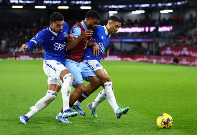 Everton's Ben Godfrey and Lewis Dobbin in action with Burnley's Lyle Foster