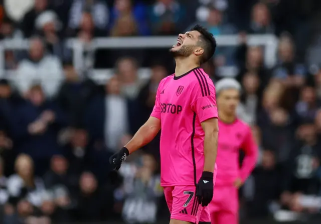 Fulham's Raul Jimenez reacts after being shown a red card