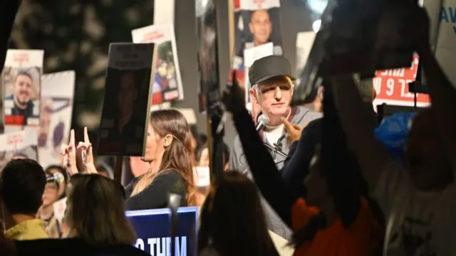 US actor Michael Rappaport speaks during a rally with the families of hostages and their supporters outside The Museum of Art known as the 'The Hostages and Missing Square' on December 16, 2023 in Tel Aviv, Israel.