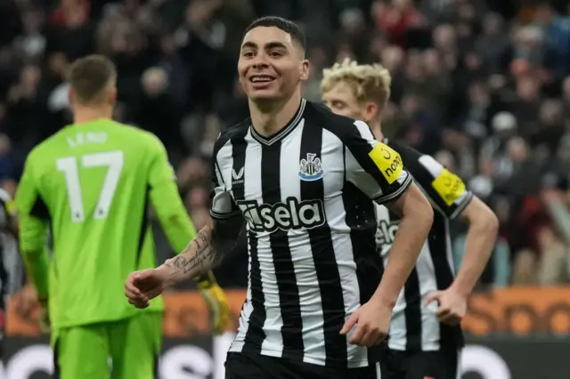 Miguel Almiron celebrates after scoring