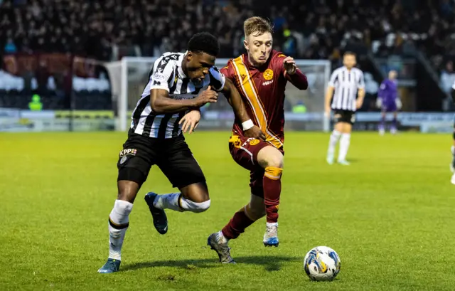 Thierry Small battles for possession with Georgie Gent