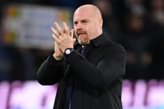 Dyche applauds the Burnley fans on his return to Turf Moor.