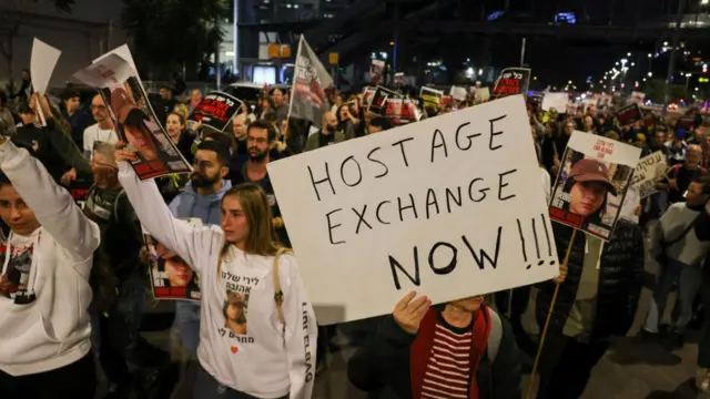 Families and supporters of hostages hostages held by Palestinian militants since the October 7 attack hold a demonstration outside the Israeli ministry of defence in Tel Aviv on December 15, 2023, calling for an immediate deal or their release in exchange for Palestinian prisoners, amid continuing battles between Israel and the Palestinian militant group Hamas.