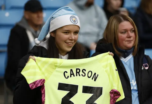 Man City fan with Scott Carson shirt