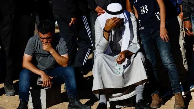 Mourners attend the funeral of Samer Fouad Al-Talalka, a member of Israel's Bedouin Arab minority who was mistakenly killed by the Israeli military while being held hostage in Gaza by the Palestinian Islamist group Hamas, in Hura village, southern Israel, December 16, 2023.