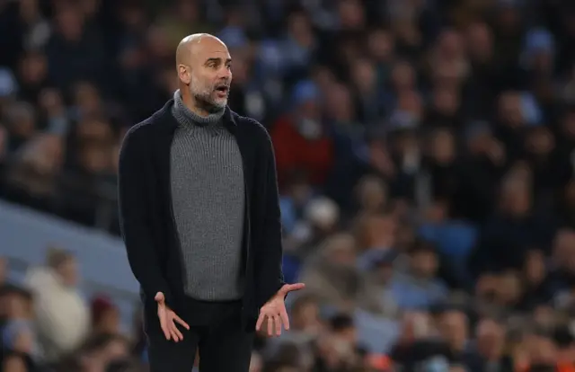 Manchester City manager Pep Guardiola reacts