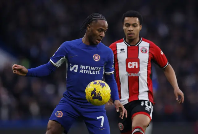 Chelsea's Raheem Sterling in action with Sheffield United's Cameron Archer