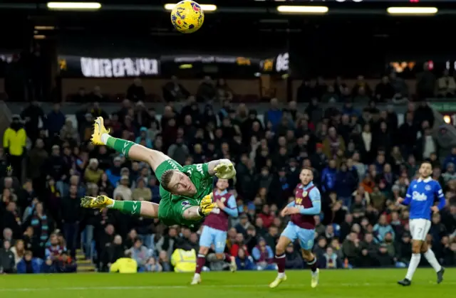 Everton goalkeeper Jordan Pickford makes a save