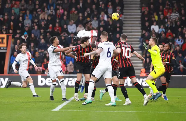 Elijah Adebayo of Luton Town scores