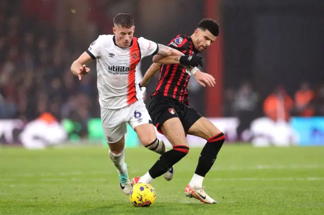 Ross Barkley of Luton Town is fouled by Dominic Solanke of AFC Bournemouth