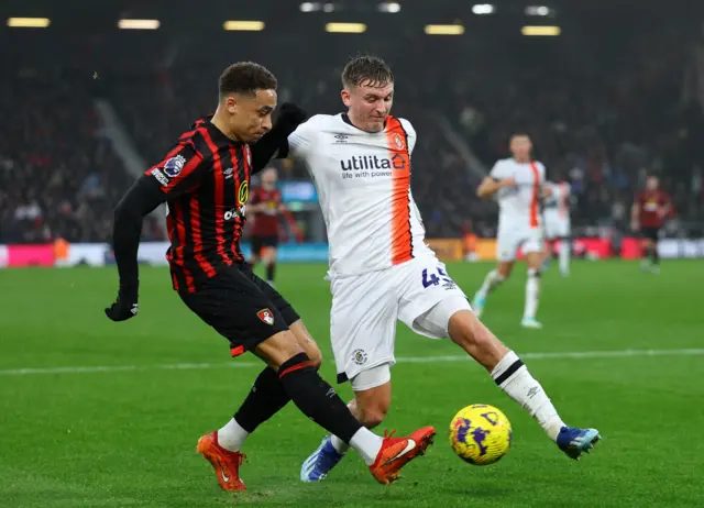 Luton Town's Alfie Doughty in action with AFC Bournemouth's Marcus Tavernier