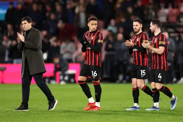 Andoni Iraola, Manager of AFC Bournemouth, and Marcus Tavernier, Adam Smith and Lewis Cook applaud the fans