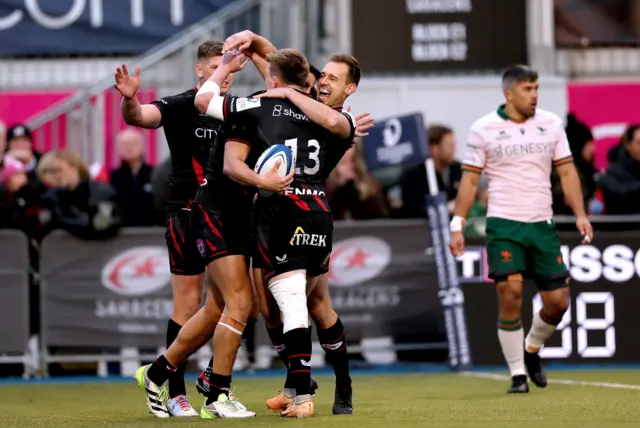 Saracens celebrate try