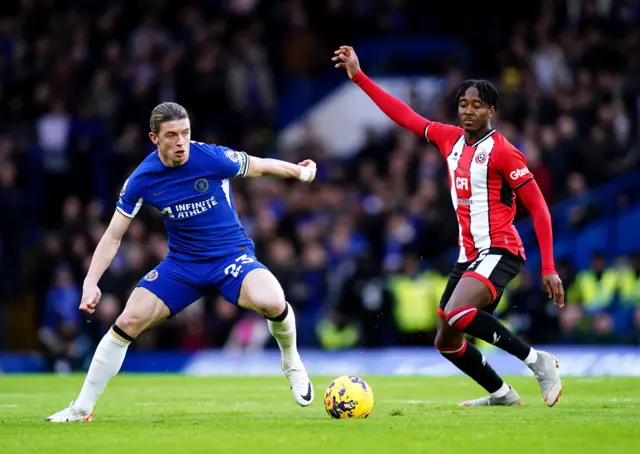 Chelsea's Conor Gallagher (left) and Sheffield United's Andre Brooks battle for the ball