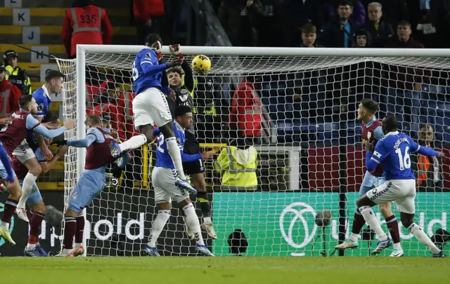 Onana beats Trafford to a cross to head the ball in for the opener.