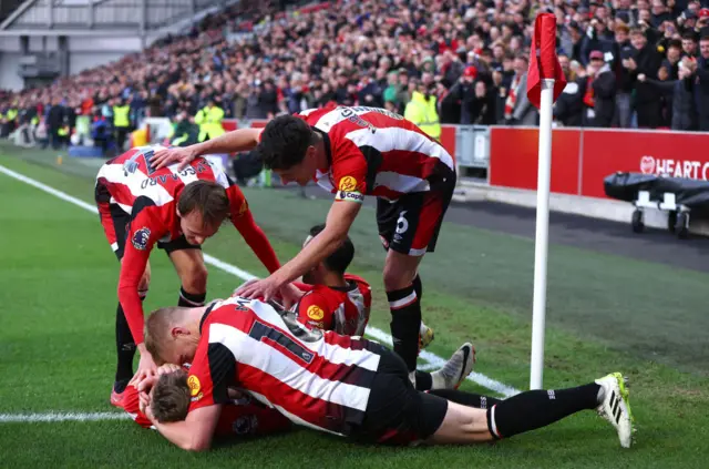 Keane Lewis-Potter of Brentford celebrates his goal