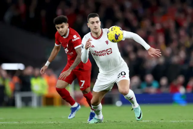 Diogo Dalot of Manchester United runs with the ball during the Premier League match between Liverpool FC and Manchester United