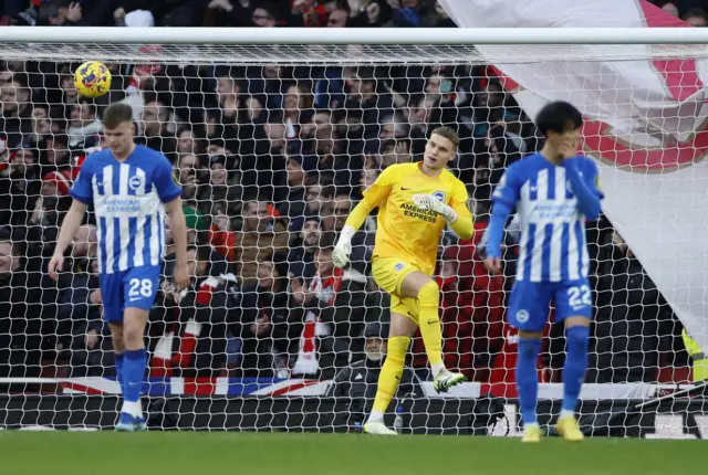 Brighton & Hove Albion's Bart Verbruggen reacts after Arsenal's Gabriel Jesus scores