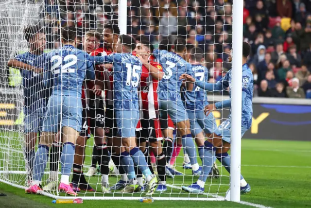 Fighting breaks out after Ollie Watkins of Aston Villa scores their teams second goal during the Premier League match between Brentford FC and Aston Villa