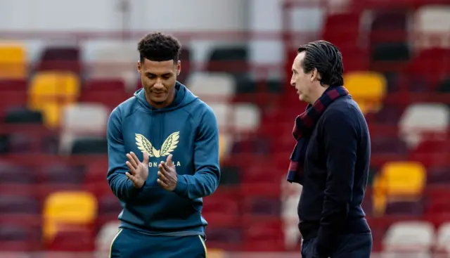 Aston Villa's Ollie Watkins chats to manager Unai Emery