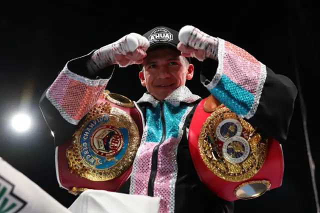 Jesse Rodriguez with his belts