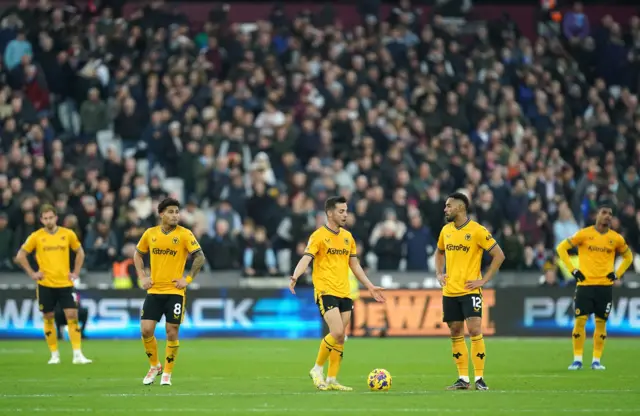 Wolverhampton Wanderers players react after West Ham United's Jarrod Bowen score