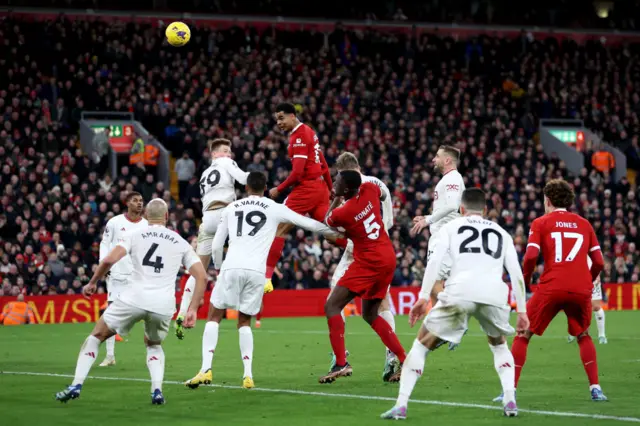 Cody Gakpo of Liverpool heads the ball