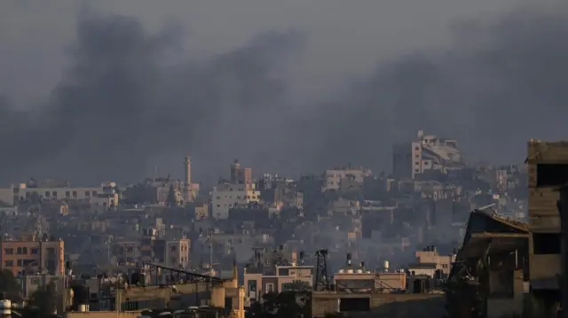 Smoke rises following Israeli air strikes in Khan Younis, southern Gaza Strip