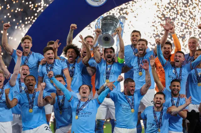 Manchester City lift the Champions League trophy