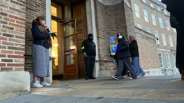 People walking into Bristol City Council's headquarters