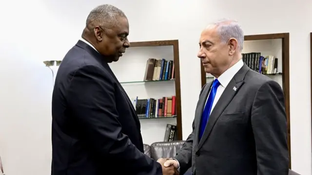 A handout photo made available by the US Embassy in Israel shows US Secretary of Defense Lloyd Austin (L) meets Israeli Prime Minister Benjamin Netanyahu (R), at the Kirya military base in Tel Aviv, Israel, 18 December 2023. US Secretary of Defense Lloyd Austin visits Israel, Tel Aviv - 18 Dec 2023