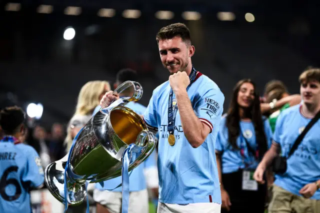 Manchester City's Rodri with the Champions League trophy