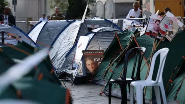 Tents outside the Israeli Ministry of Defence where families of hostages have been sleeping as they continue to campaign for the release of their loved ones