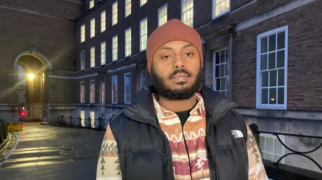 Shaban Ali standing outside Bristol City Council's headquarters