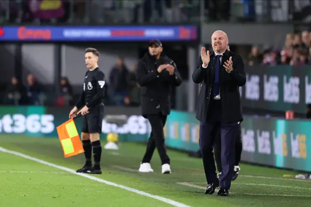 Sean Dyche claps his hands on the sideline during the game