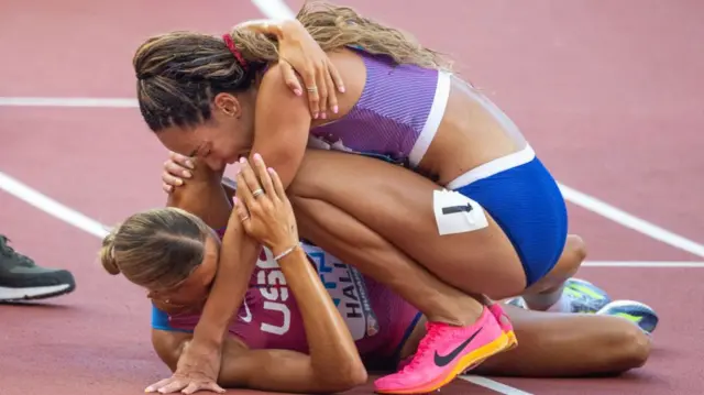 Katarina Johnson-Thompson consoles Anna Hall