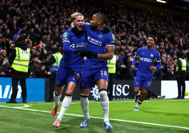 Mykhailo Mudryk celebrates with Christopher Nkunku