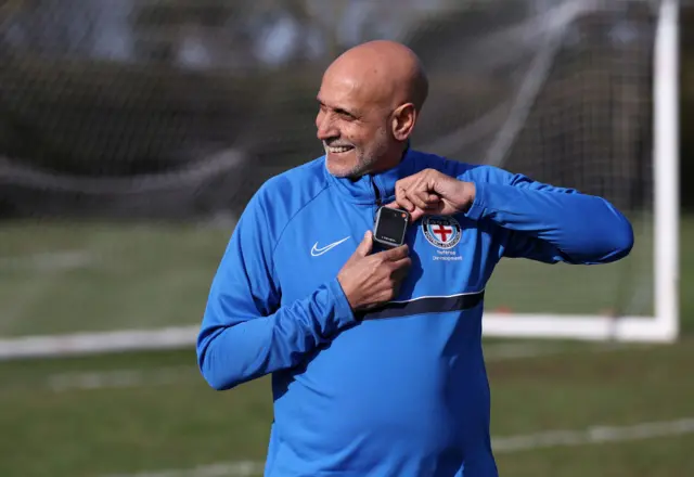 Mohammed Ghafoor, North Riding FA refereeing Ambassador, prepares to test a referee bodycam