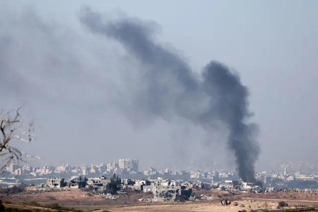 Smoke rises above the Gaza Strip during Israel's bombardment, amid continuing battles between Israel and Hamas