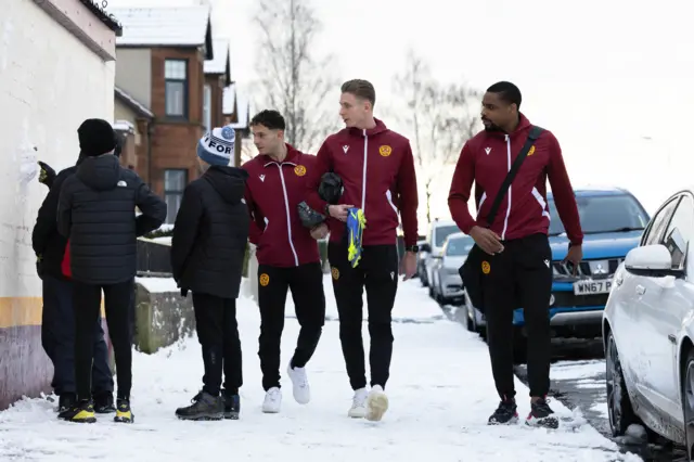 Motherwell's Davor Zdravkovski, Oli Shaw and Jonathan Obika arrive during a cinch Premiership match between Motherwell and Dundee at Fir Park