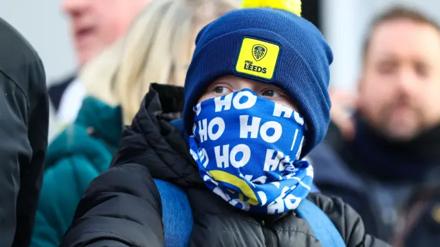 Leeds United fan wrapped up against the cold