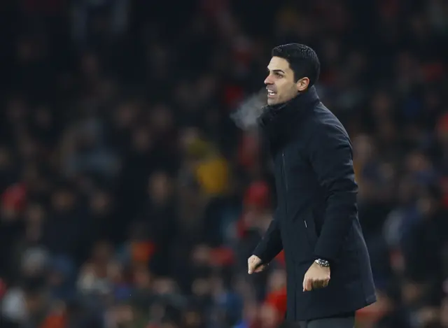 Arteta stands angrily on the touchline after his side concede.