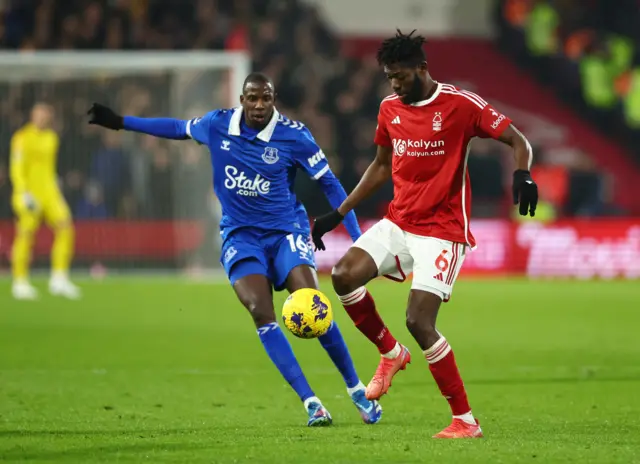 Sangare controls the ball as Doucore looks on.