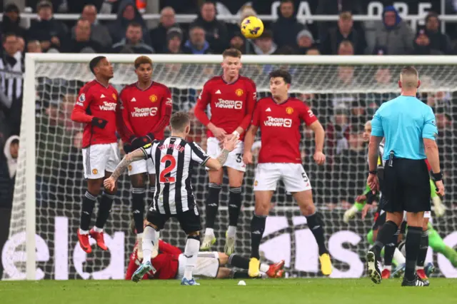 Kieran Trippier hits a free kick