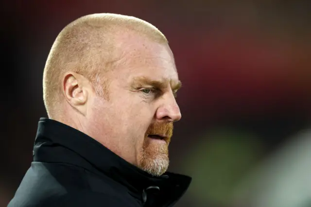 Dyche looks on at the game angrily.